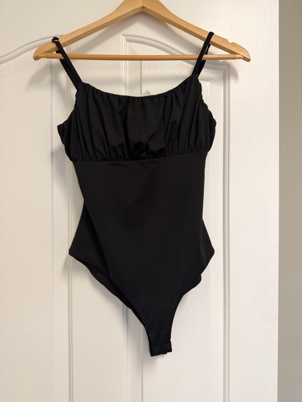 Black Ruched Bust One-Piece Bodysuit